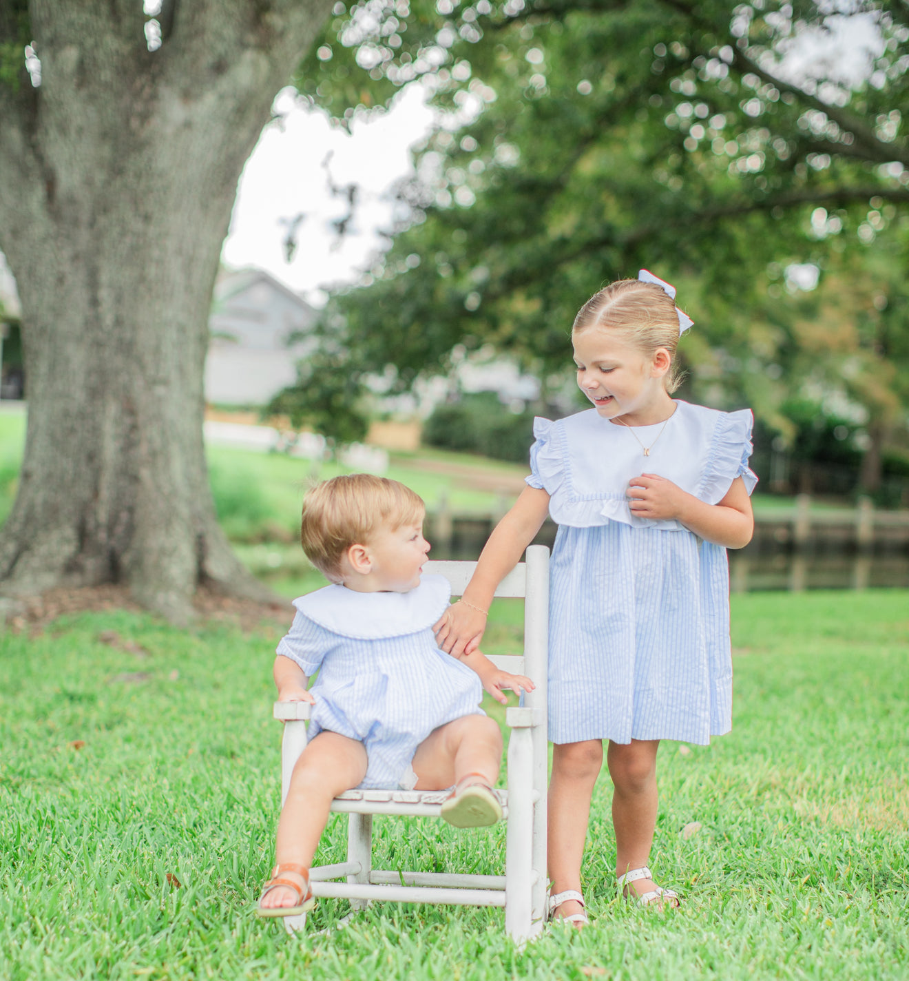 Riley ruffle dress in blue stripe